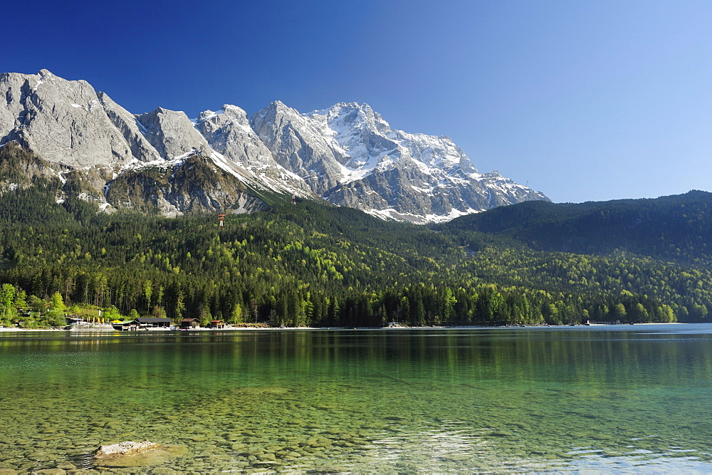 Zugspitze above lake Eibsee in the sunlight, lake Eibsee, Garmisch-Partenkirchen, Wetterstein range, Werdenfels, Upper Bavaria, Bavaria, Germany, Europe