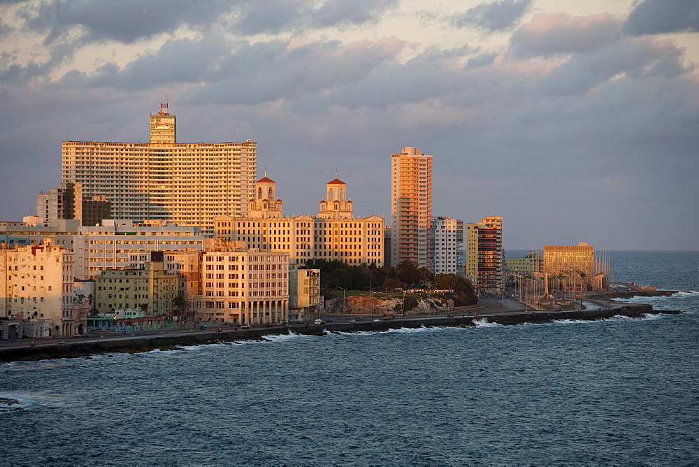 Buildings, Hotel Nacional in the center and Malecon sea drive at sunrise, City of Havana, Havana, Cuba