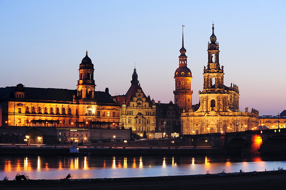 Illuminated city of Dresden with Staendehaus, Georgentor gate, Dresden castle and cathedral, river Elbe in the foreground, Dresden, Saxony, Germany, Europe