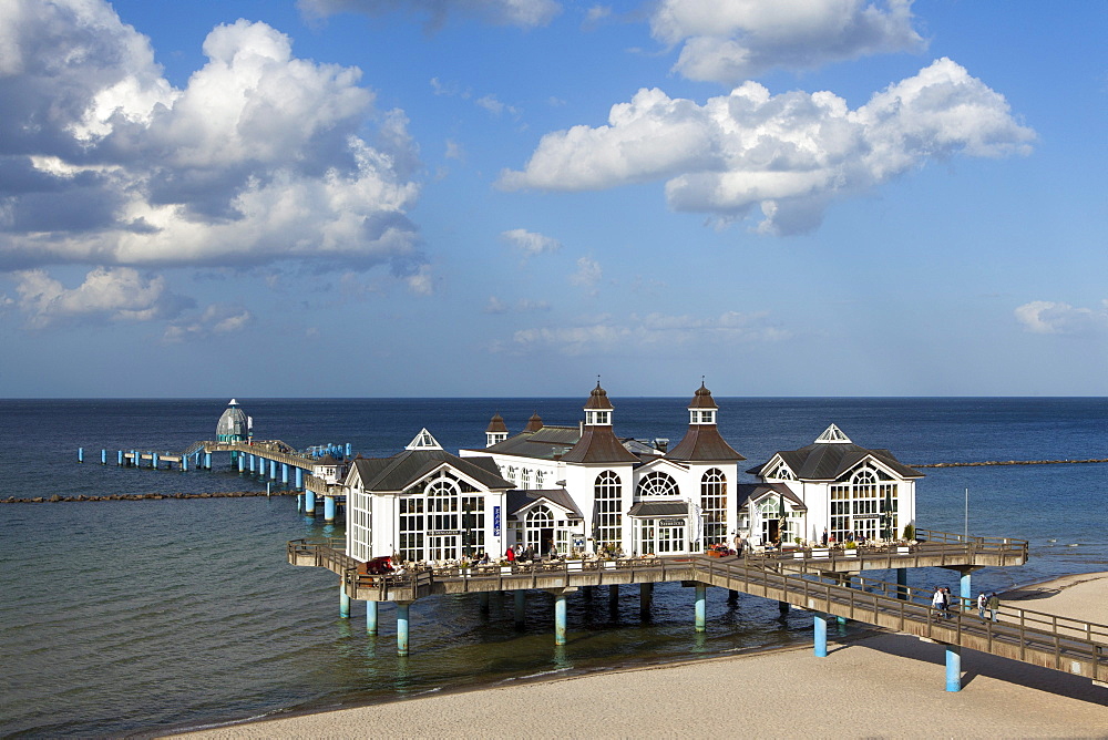 Clouds over the pier and beach, Sellin seaside resort, Ruegen island, Baltic Sea, Mecklenburg-West Pomerania, Germany