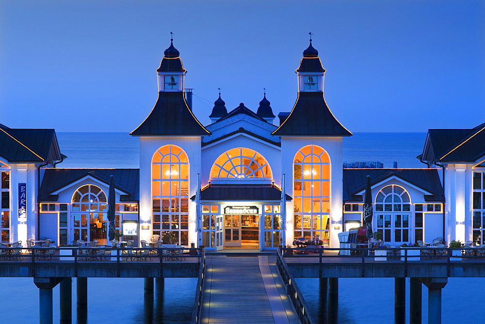 Illuminated pier in the evening, Sellin seaside resort, Ruegen island, Baltic Sea, Mecklenburg-West Pomerania, Germany