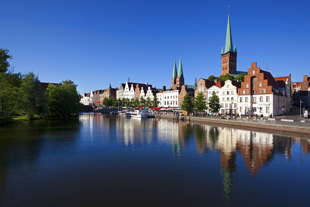 View over the Trave river to the old town of Luebeck with St MaryÂ¥s church and church of St Petri, Hanseatic city of Luebeck, Baltic Sea, Schleswig-Holstein, Germany