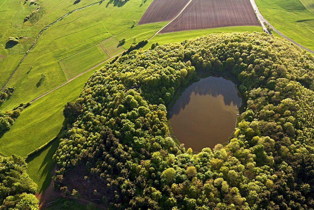 Aerial view of Windsborn crater lake, rural district of Daun, Eifel, Rhineland Palatinate, Gemany, Europe