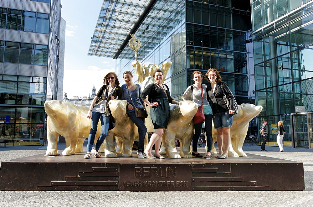 Tourists standing next to bear sculptures at Neues Kranzler Eck, Kurfuerstendamm, Charlottenburg, Berlin, Germany