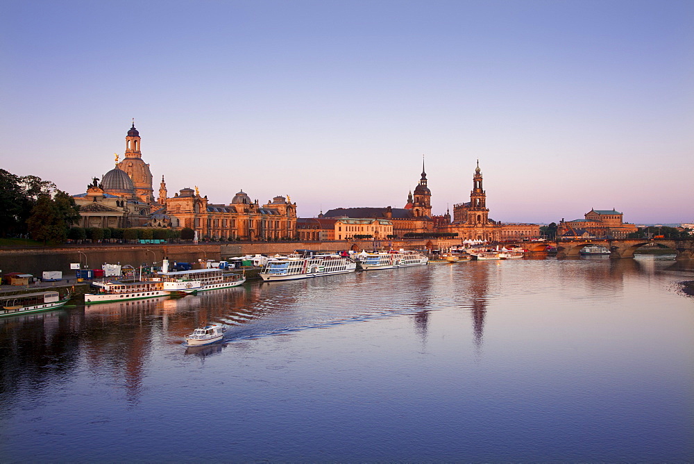 Panoramic view over the Elbe river to Bruehlsche Terrasse, University of visual arts, Frauenkirche, Staendehaus, Dresden castle, Hofkirche and Semper Opera in the evening, Dresden, Saxonia, Germany, Europe