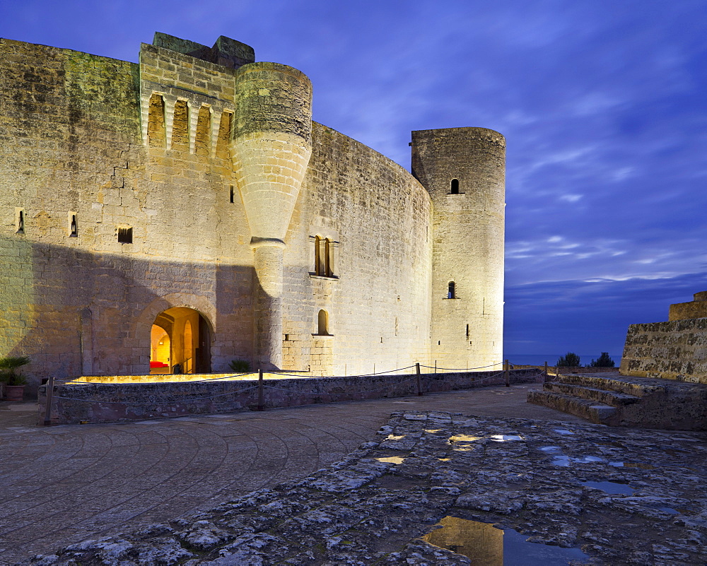 Castell de Bellver under clouded sky in the evening, Palma, Mallorca, Spain, Europe