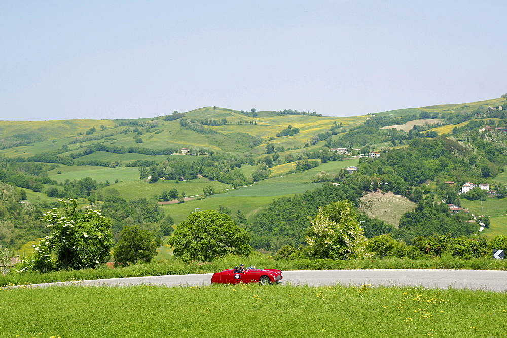 Vintage car on a country road, Monte Cerignone, Pesaro Urbino, Italy, Europe