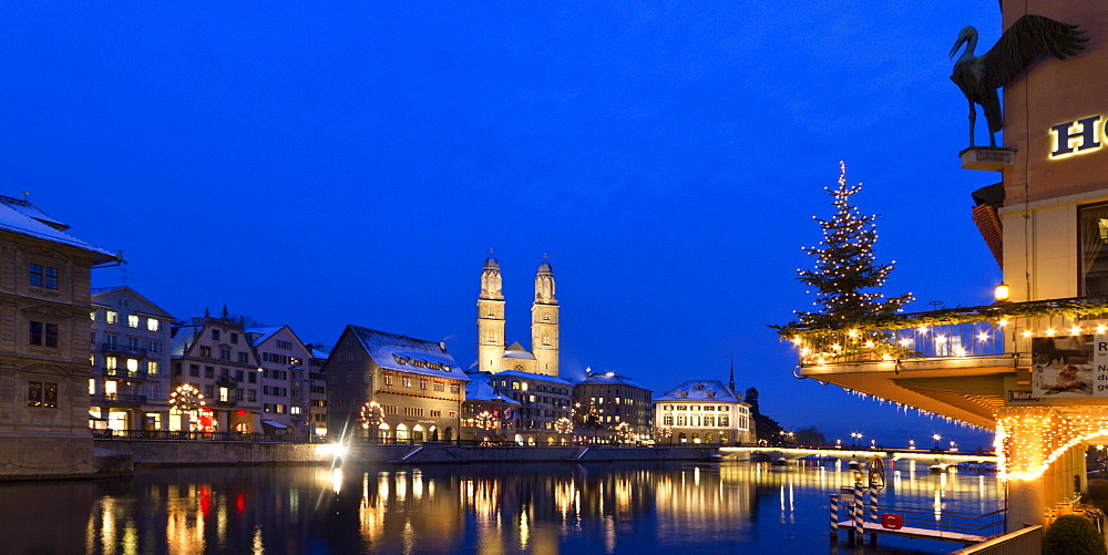 Hotel Storchen, old town center, river Limmat at night, Limmatquai Grossmunster, Zurich, Switzerland