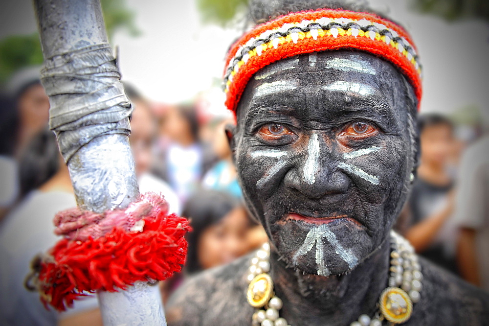 Man holding a spear at Ati Atihan festival, Kalibo, Aklan, Panay Island, Visayas, Philippines