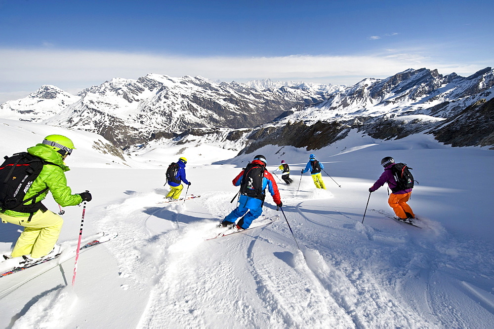 Skiers at descent, Alto Adige, South Tyrol, Italy, Europe