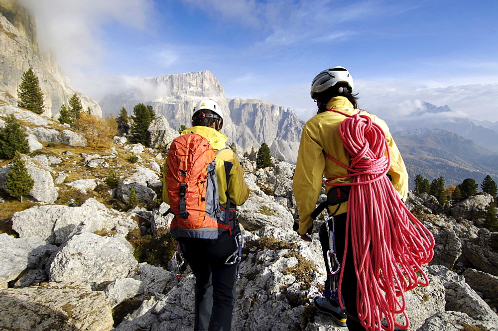 Two mountaineers with climbing rope, Alto Adige, South Tyrol, Italy, Europe