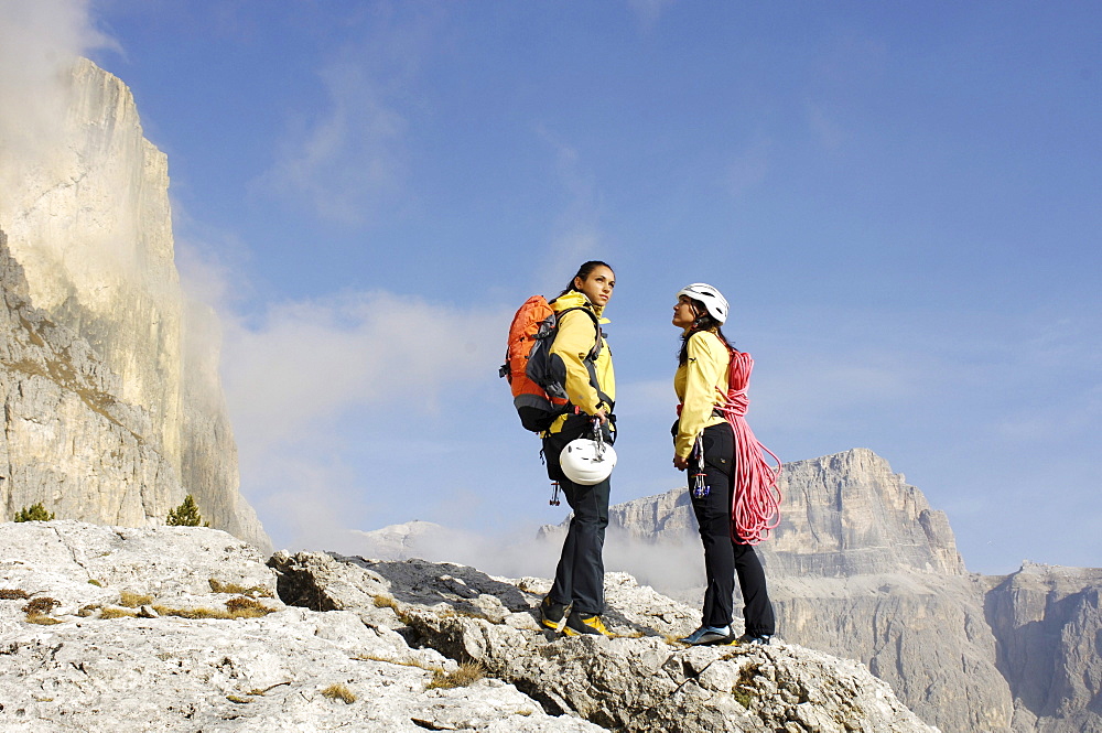 Two mountaineers with climbing rope, Alto Adige, South Tyrol, Italy, Europe