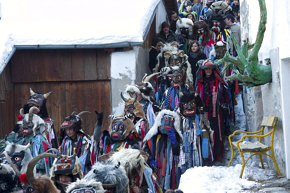 People in disguise and with masks in winter, Stilfs, Vinschgau, Alto Adige, South Tyrol, Italy, Europe