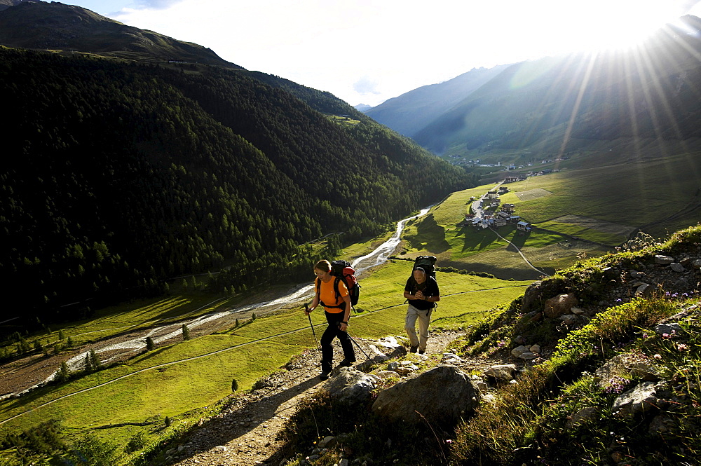 Two hikers near Langtaufers, Alto Adige, South Tyrol, Italy