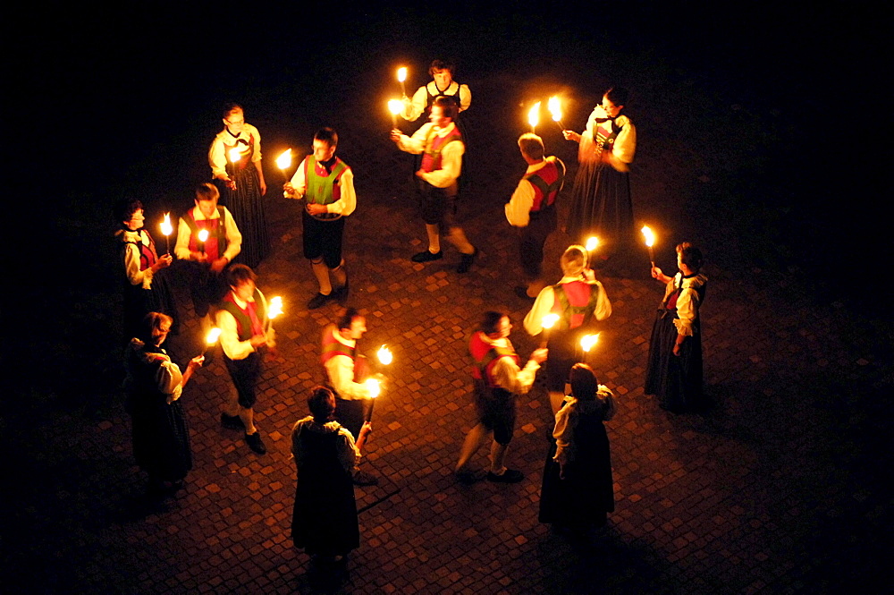 South Tyrol traditional dancing with torches, Alto Adige, South Tyrol, Italy