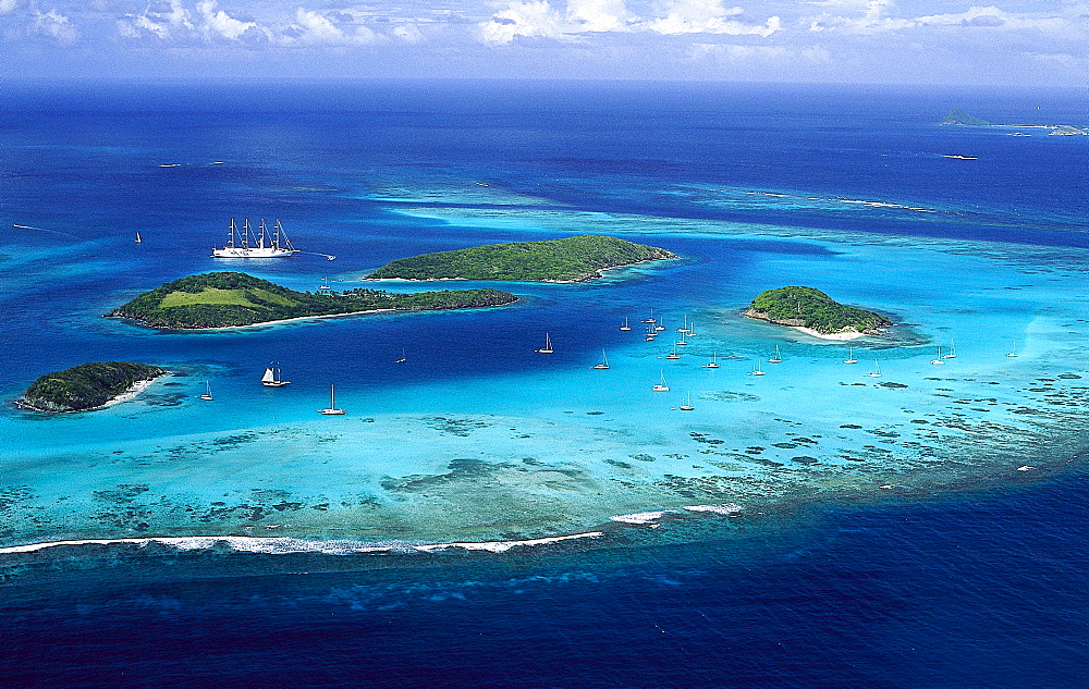 Aerial view of the archipelago Tobago Cays under clouded sky, Grenadines, Caribbean, America