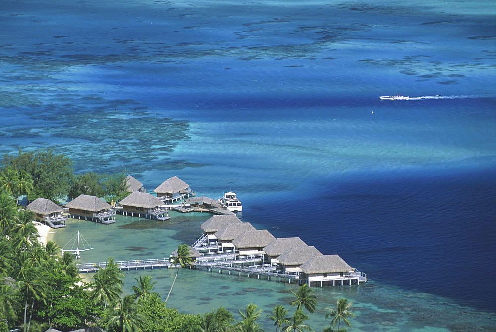 View at the bungalows of the Bora Bora hotel on the waterfront, Bora Bora, French Polynesia, Oceania