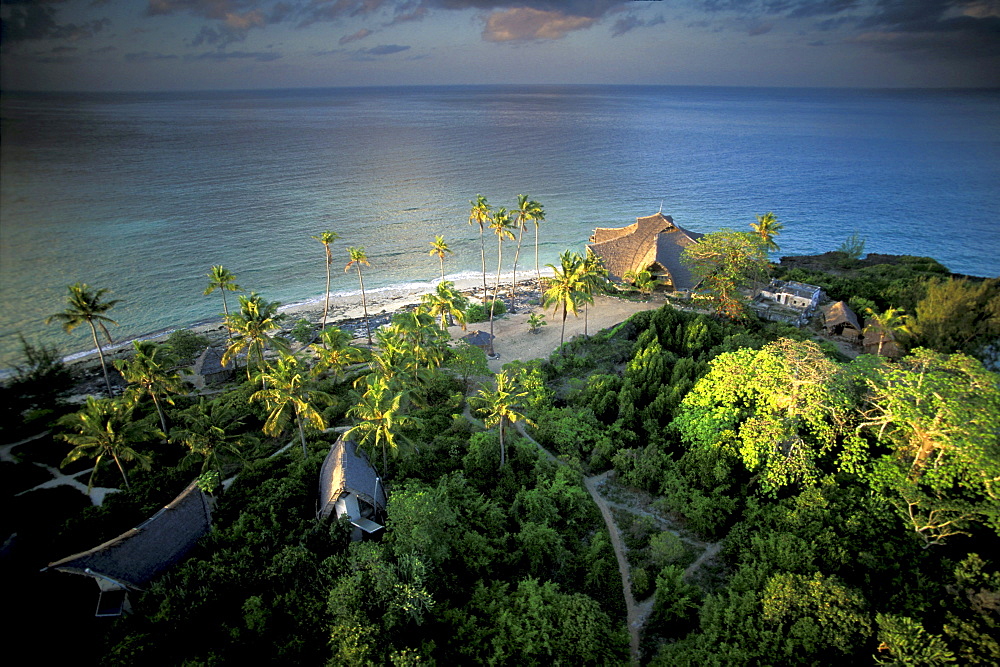 View at bungalows at the nature reserve on Chumbe island under clouded sky, Zanzibar, Tanzania, Africa