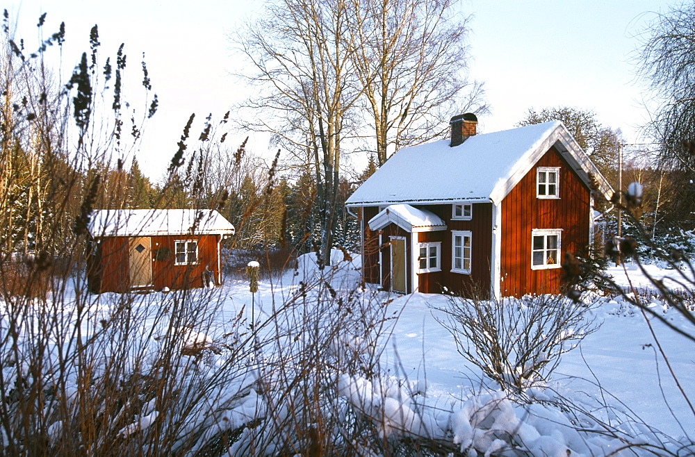 Sommer house in a winter landscape, South of Boras, Vastergotland, Sweden