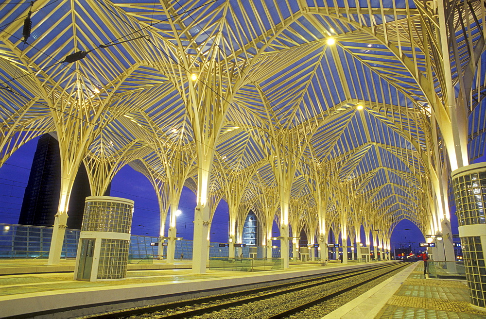 Illuminated, deserted railway station in the evening, Gare do Oriente, Parc de Nacoes, Lisbon, Portugal