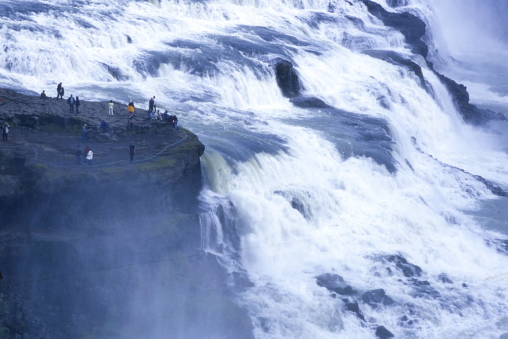 People at Godafoss Waterfall, Skjalfandafljo River, Near Akureyri, Iceland