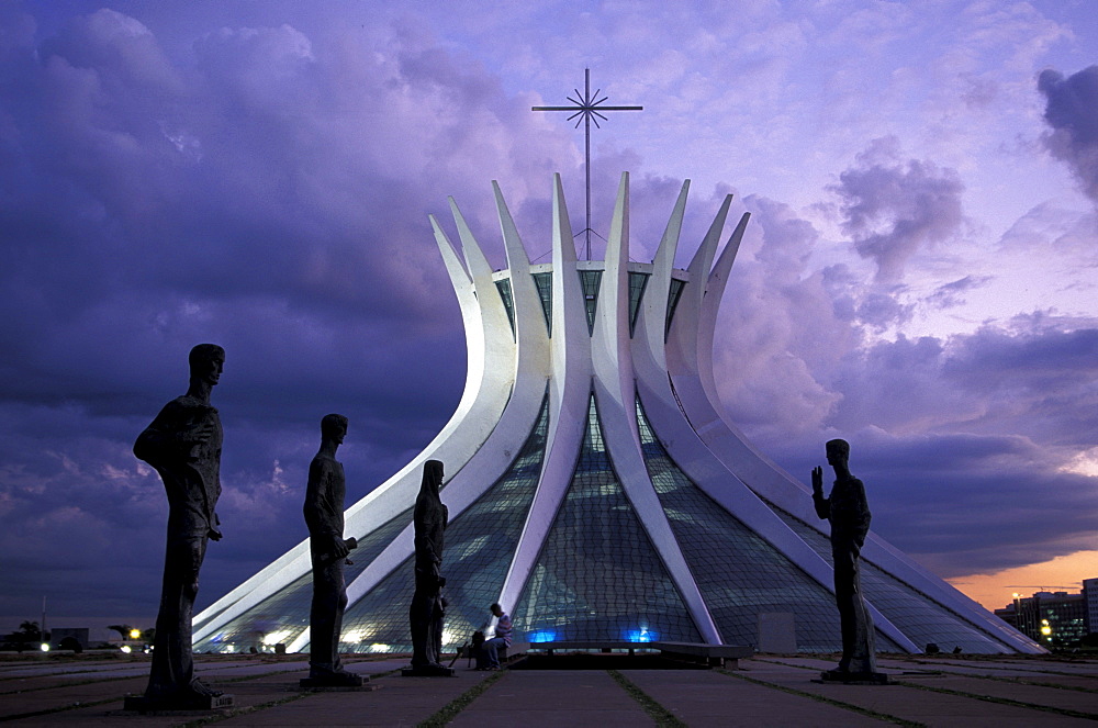 Statues in front of Metropolitana Cathedral in the evening, Brasilia, Brazil, South America, America