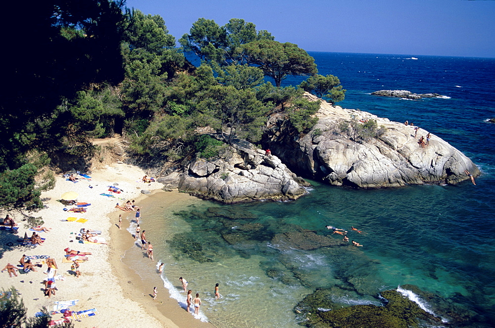 Sandy beach and bay at Platja del Pi, near Platja d'Aro, Costa Brava, Catalonia, Spain