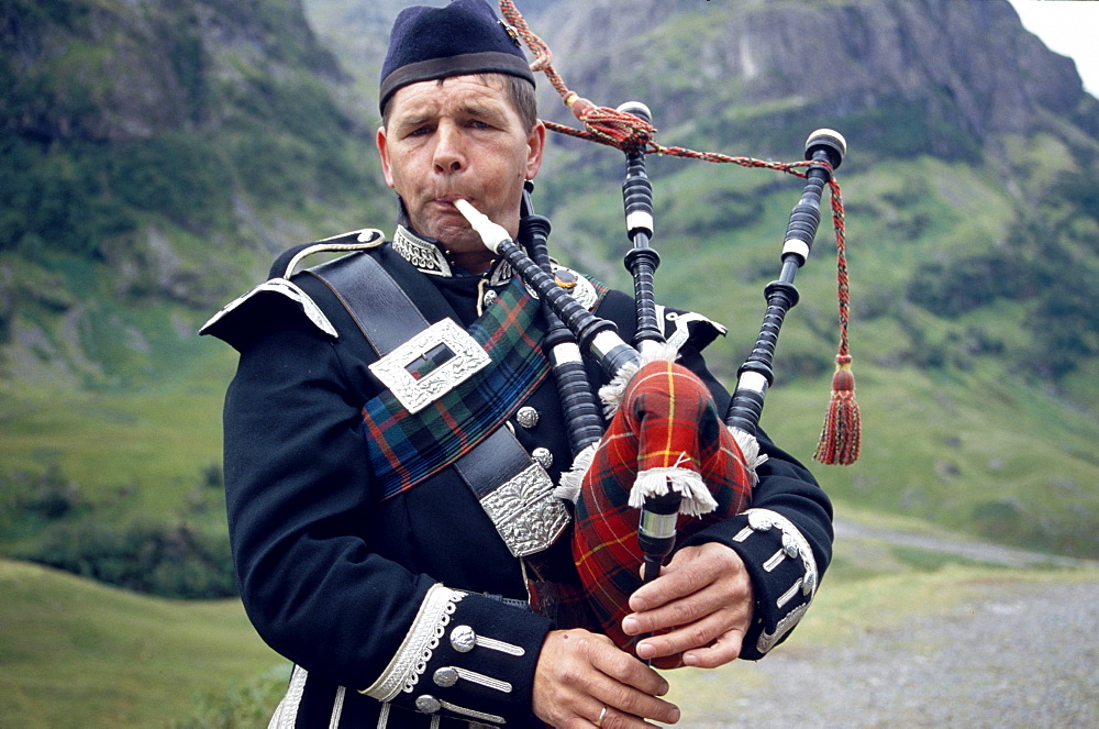 Bagpipe player at Glenfinnan Highland Games, Glen Coe valley, Invernesshire, Scotland, Great Britain, Europe