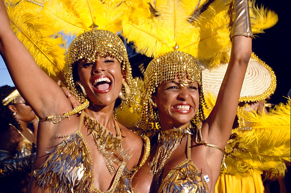 Women in costumes dancing at Mardi Gras, Port of Spain, Trinidad and Tobago