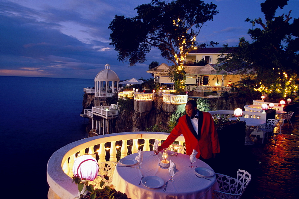 Waiter preparing the table for diner, La Puntilla De Piergiorgio Palace, Italian Restaurant, Sosua, Dominican Republic, Caribbean