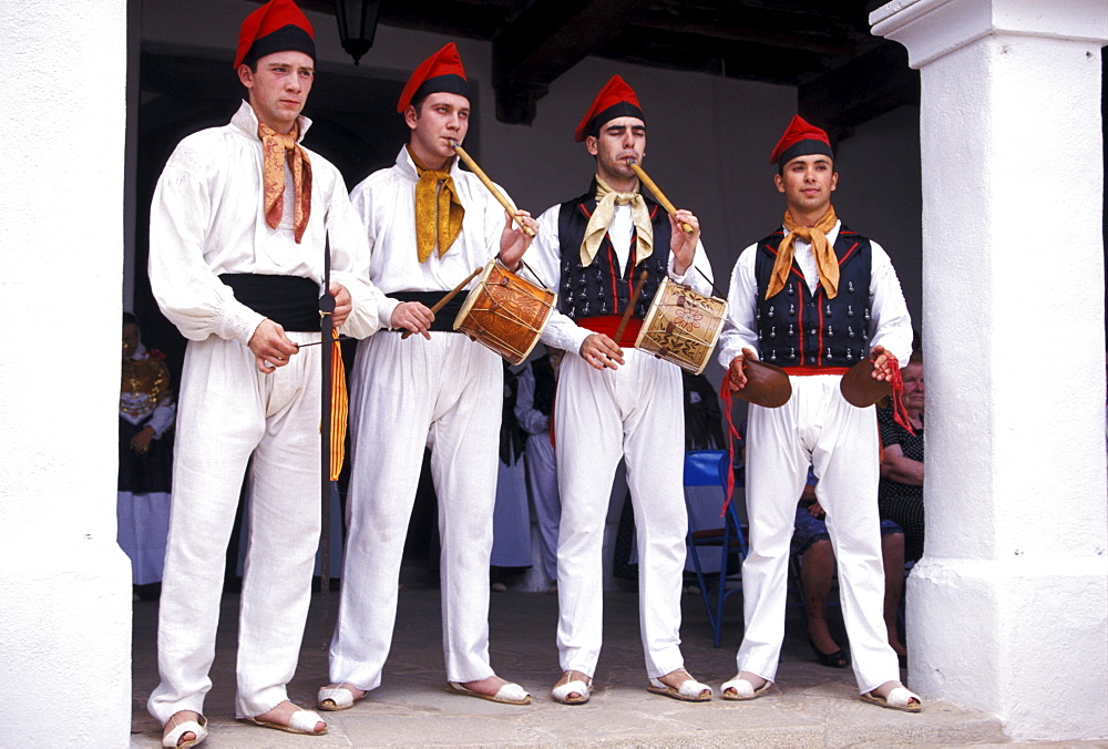 Four men wearing traditional clothes and playing tradional misic, Folklore, Sant Miquel, Ibiza, Balearic Islands, Spain