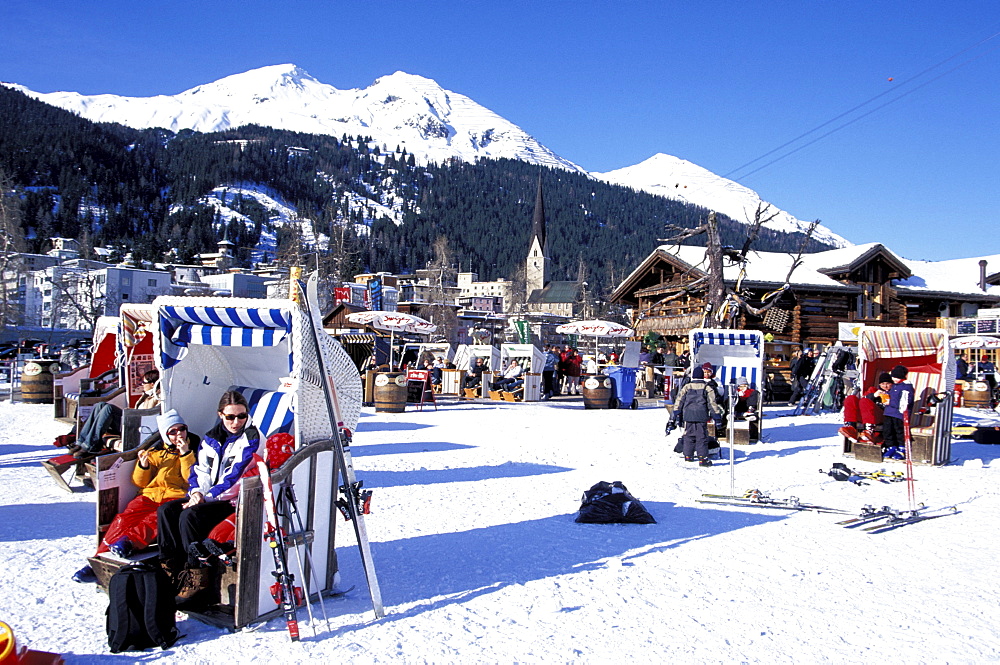 People at AprÃˆs Ski in beach chairs, Bolgen Plaza, Davos, Grisons, Switzerland, Europe