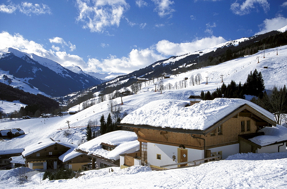 Ski hut at snowy mountainside, Saalbach, Salzburger Land, Austria, Europe