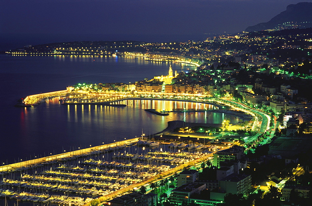 Illuminated seaport at night, Menton, Cap Martin, Cote dÂ¥Azur, Alpes Maritimes Provence, France, Europe