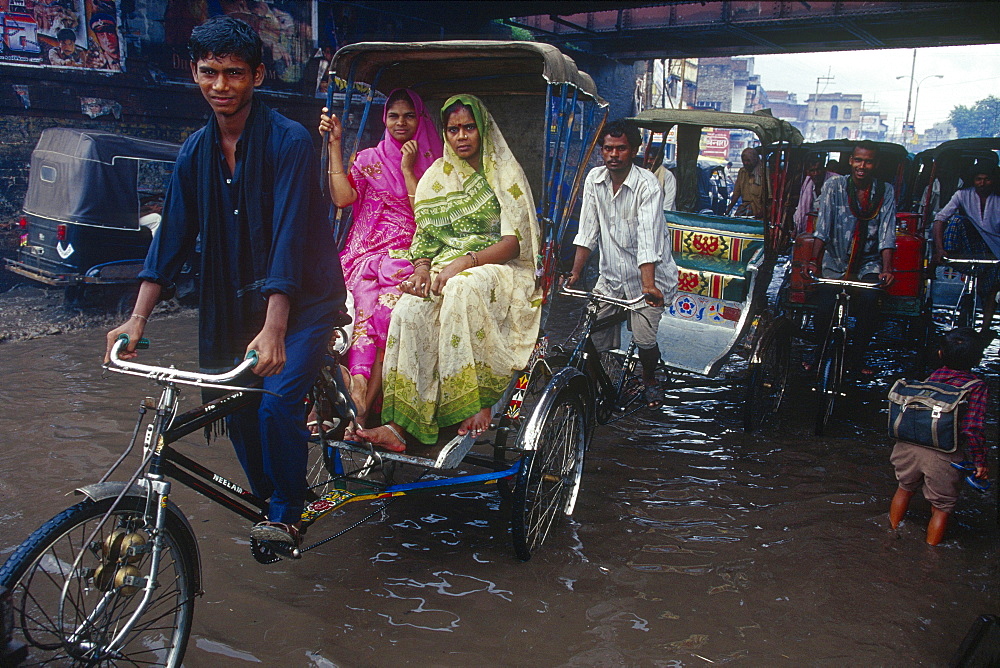 Rickshaw, monsoon, inundation, Varanasi, Benares, Uttar Pradesh, India