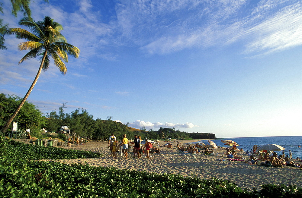 People sunbathing on Boucan Canot beach, La RÃˆunion, Indian Ocean