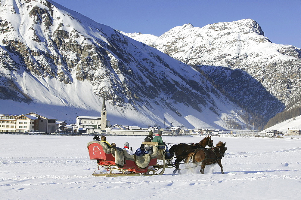 Tourists on a sleigh ride, Livigno, Italy