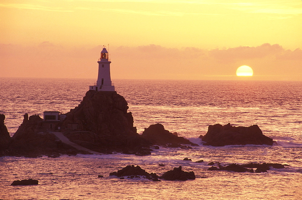 CorbiÈre lifghthouse at sunrise, Jersey, Channel Islands, Great Britain