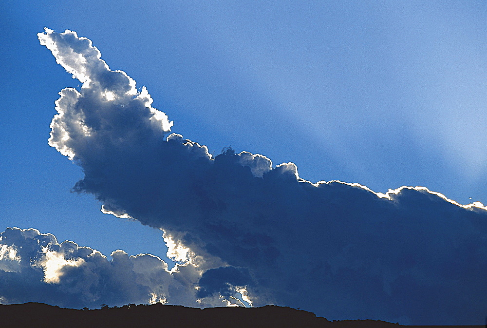 Cloud shaped like an arm with upraised index finger