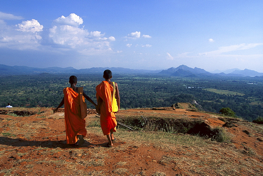 Two Monks on Sigiriya Rock, Lion's rock, an ancient rock fortress, Sigiriya, Sri Lanka