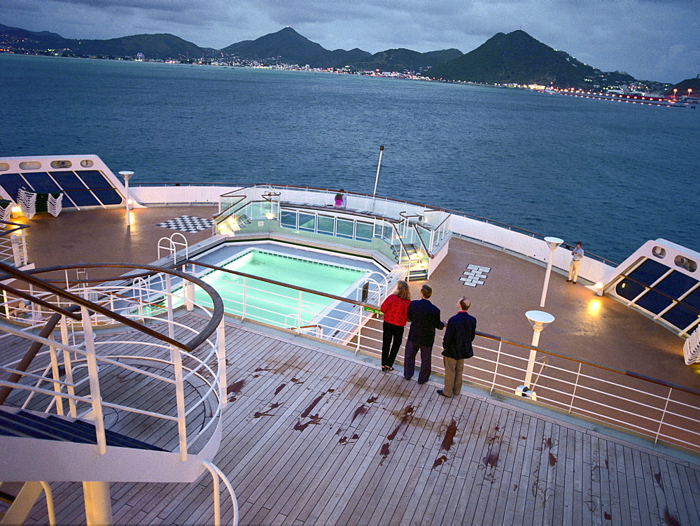 People on the quarterdeck looking towards the coast, Queen Mary 2, St. Maarten, Caribbean