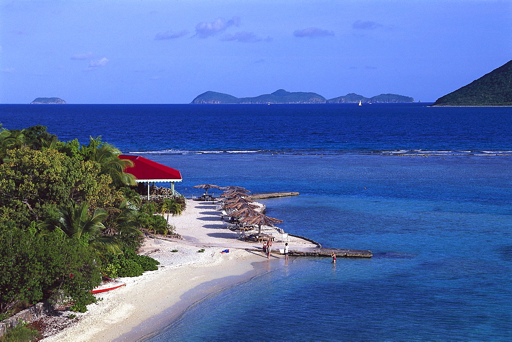 Sandy beach with sunshades in the sunlight, Marina Cay, British Virgin Islands, Caribbean, America