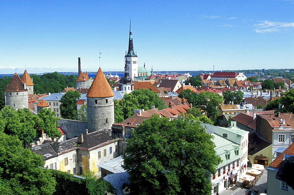 View over the old town of Tallinn from Rohukohtu terrace. The towers of the city walls in the front, St. Michael's Monastery and St. Olaf's Church in the back, Tallinn, Estonia