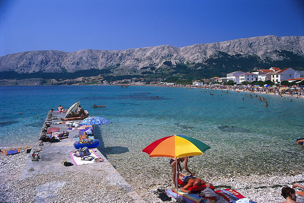 People on the beach in the sunlight, Baska, Krk, Croatia, Europe