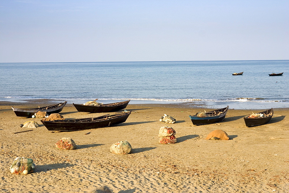 Fishing boats on the beach of Cuthbert Bay, Long island, Andamanen, Indien