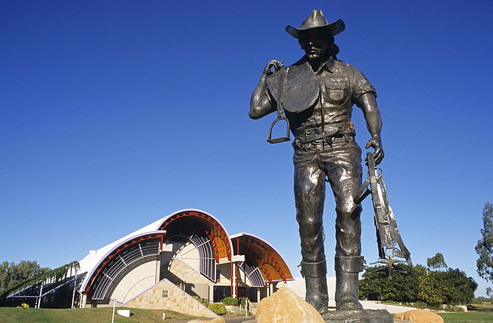 Statue of a stockman outside the Australian Stockman's Hall of Fame museum, museum dedicated to the history of the outback settlers such as explorers, sheep shearers stockmen, Longreach, Queensland, Australia