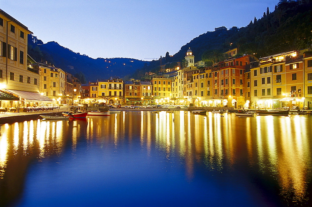 Illuminated restaurants at harbour in the evening, Portofino, Liguria, Italy, Europe