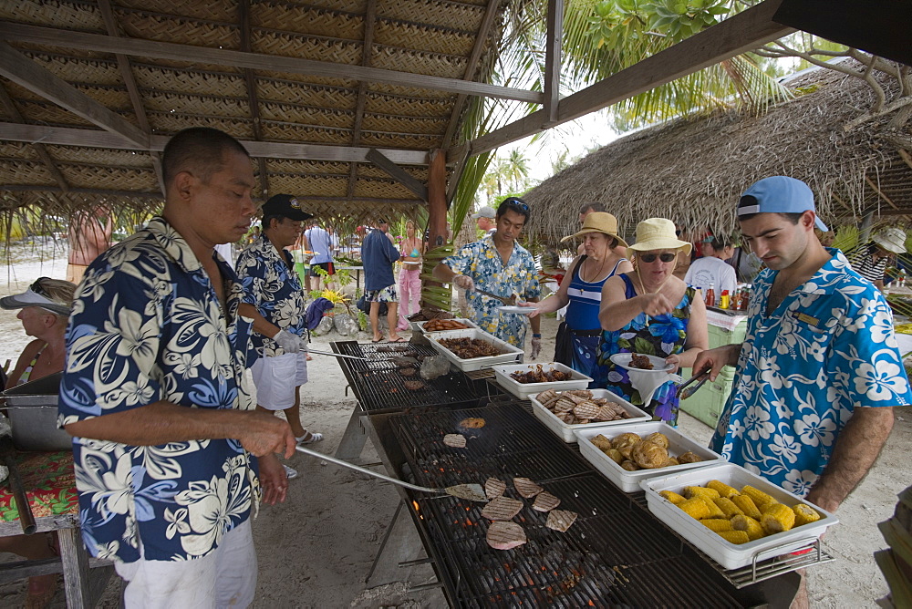 Beach barbeque lunch at a beach party for passengers of the cruiseship Star Flyer (Star Clippers Cruises), Fakarava, The Tuamotus, French Polynesia