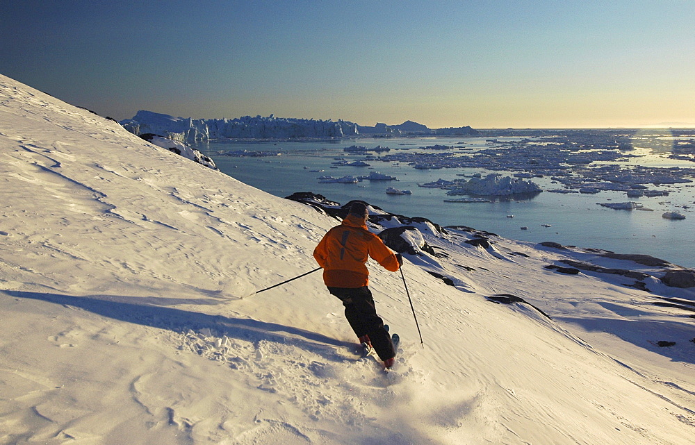 Person skiing down a slope, Ilulissat, Greenland