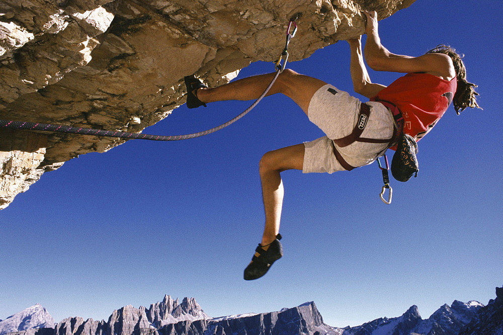 Alpine climber, free climbing, Dolomites, Italy